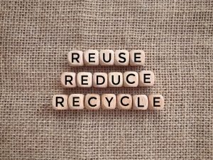 The words reuse, reduce, recycle stacked on top of each other.